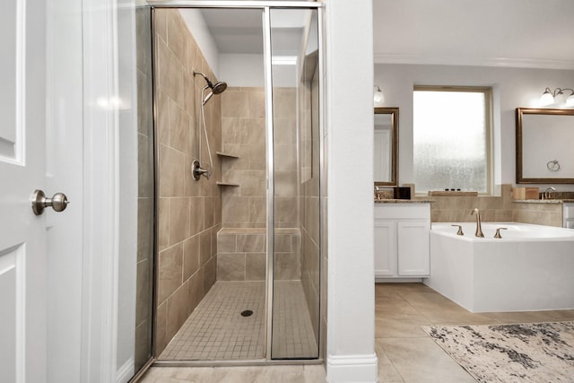 bathroom featuring ornamental molding, vanity, plus walk in shower, and tile patterned flooring