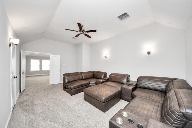 living room featuring light carpet, vaulted ceiling, and ceiling fan