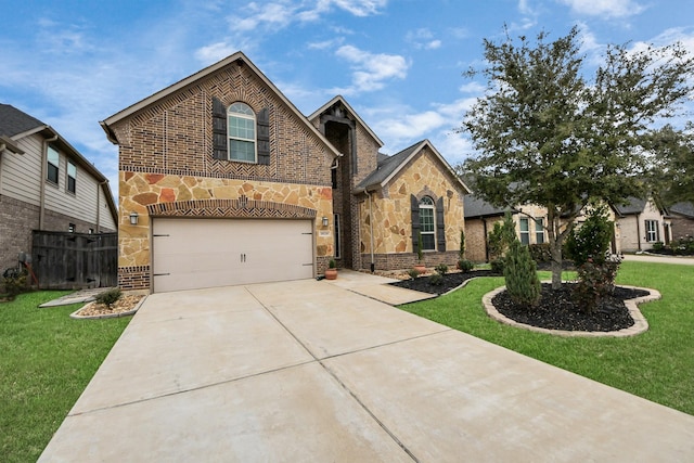 view of front of property featuring a garage and a front yard