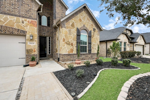 view of front of property with a garage