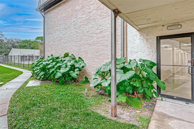 view of property exterior featuring a yard