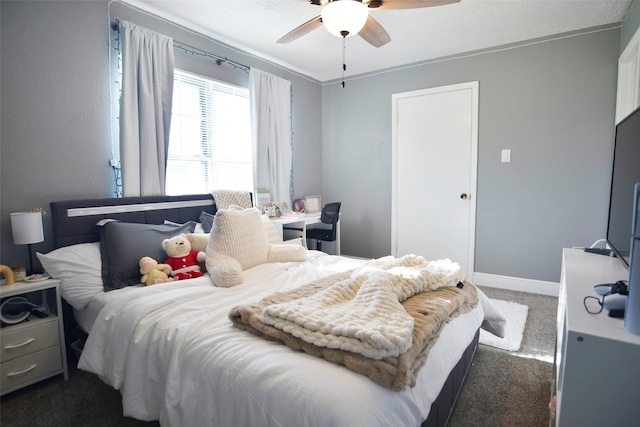 carpeted bedroom featuring ceiling fan