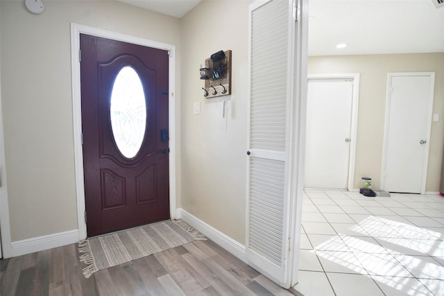 foyer with light hardwood / wood-style flooring