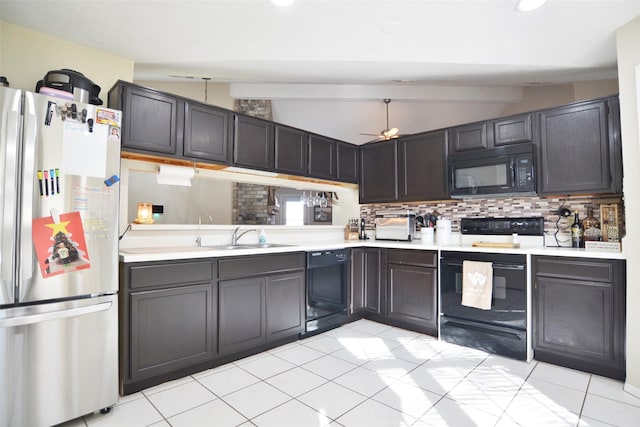 kitchen featuring lofted ceiling with beams, sink, decorative backsplash, and black appliances