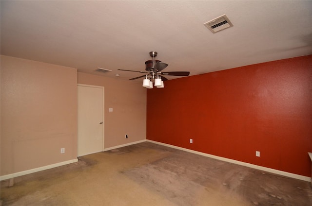 unfurnished room featuring ceiling fan and carpet flooring