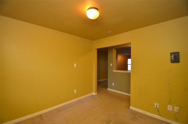 empty room featuring carpet flooring