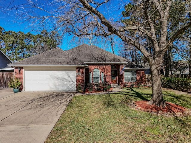 single story home with a garage and a front lawn