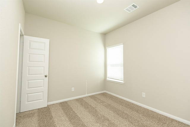 spare room with carpet flooring