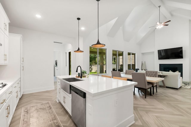 kitchen featuring sink, white cabinetry, dishwasher, an island with sink, and light parquet flooring