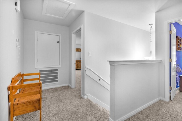 370 Goldenrod, Livingston, TX 77351 - hallway with an upstairs landing, carpet, baseboards, and attic access