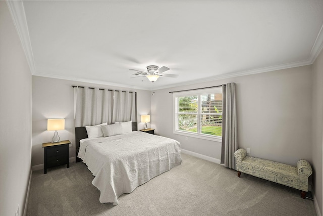 bedroom featuring ceiling fan, ornamental molding, and carpet floors