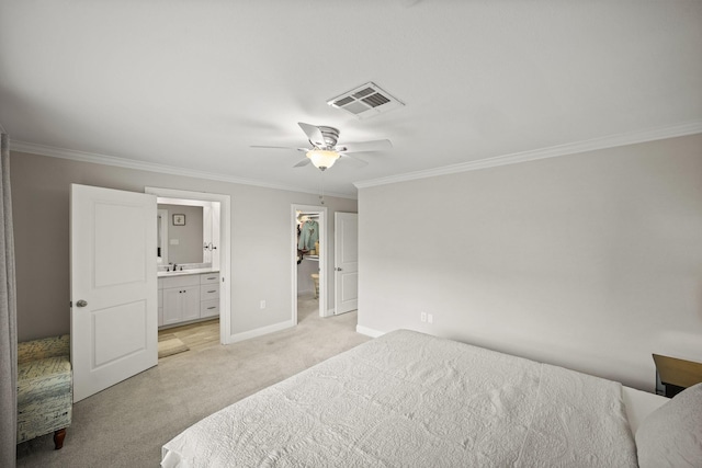 bedroom with sink, a spacious closet, ornamental molding, a closet, and ceiling fan