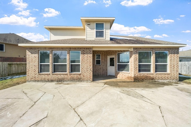 back of property featuring a patio area