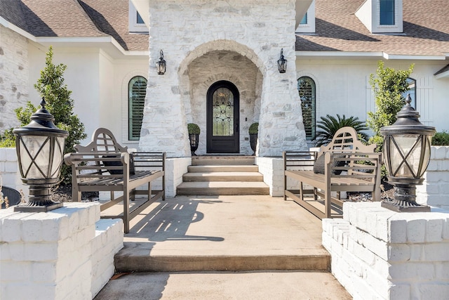 doorway to property featuring a patio