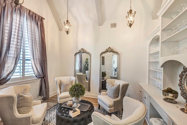 living area with hardwood / wood-style floors