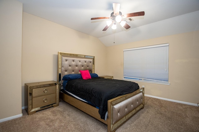 carpeted bedroom featuring vaulted ceiling and ceiling fan