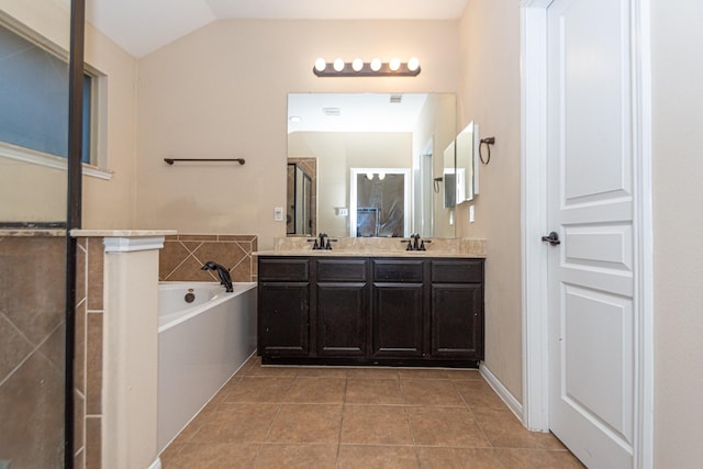 bathroom featuring lofted ceiling, vanity, tile patterned floors, and shower with separate bathtub