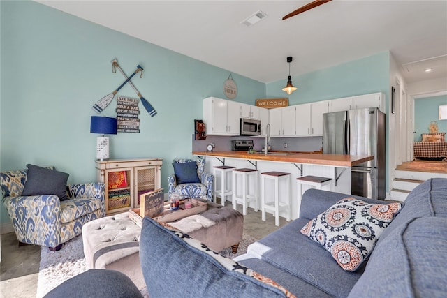 living room with sink