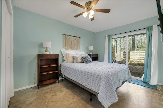 bedroom with access to outside, concrete flooring, and ceiling fan