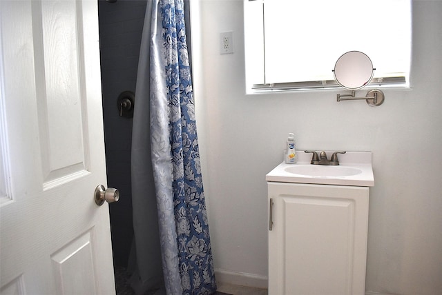 bathroom with vanity and a shower with curtain