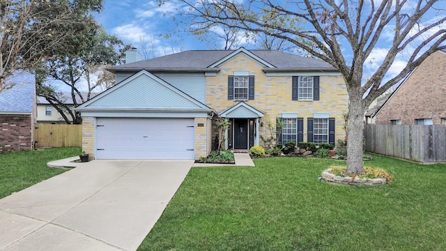 view of front of house with a garage and a front lawn