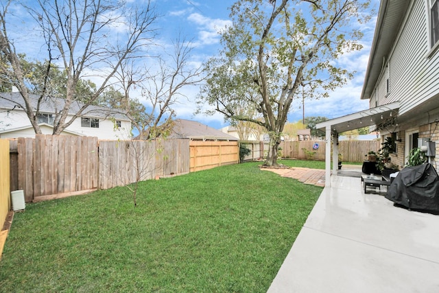 view of yard with a patio area