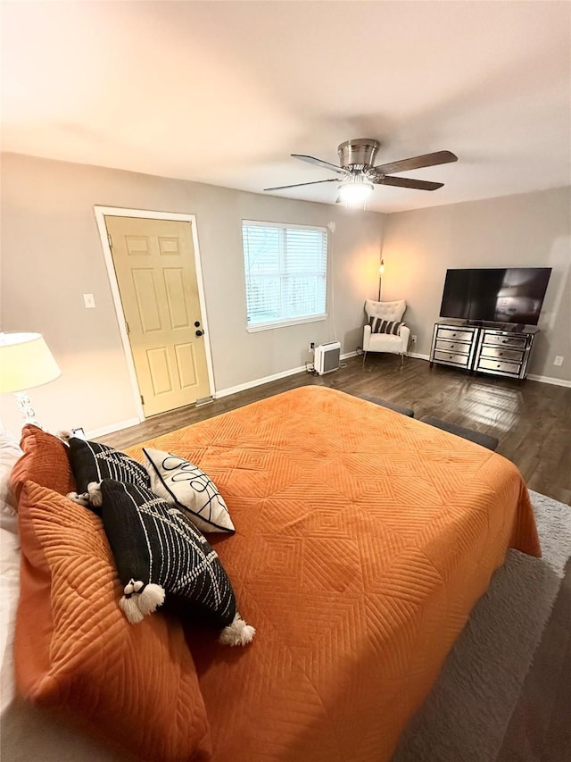 bedroom featuring ceiling fan and hardwood / wood-style floors