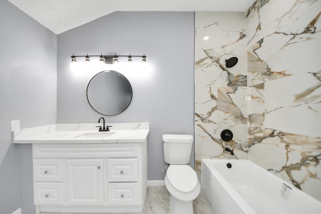 bathroom featuring vanity, vaulted ceiling, and toilet