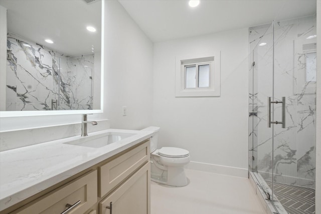 bathroom with vanity, walk in shower, and toilet