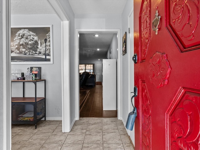 view of tiled entrance foyer