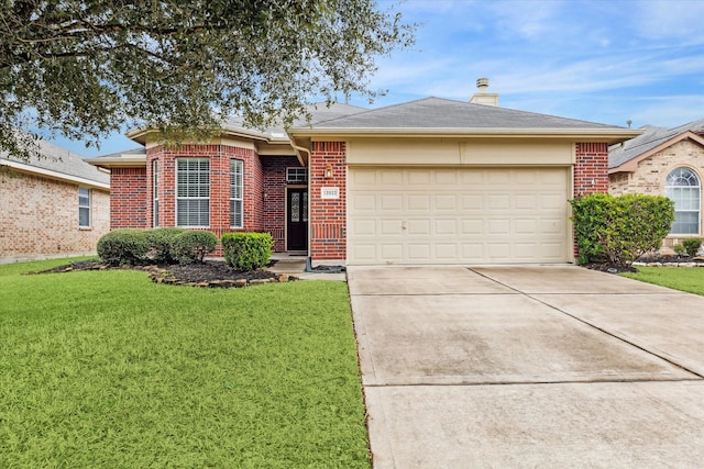 ranch-style house with a garage and a front lawn