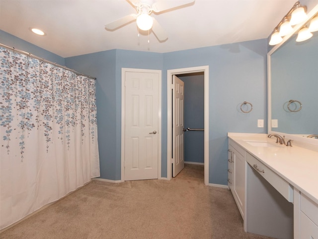 bathroom featuring vanity and ceiling fan