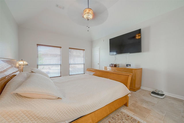 bedroom with lofted ceiling