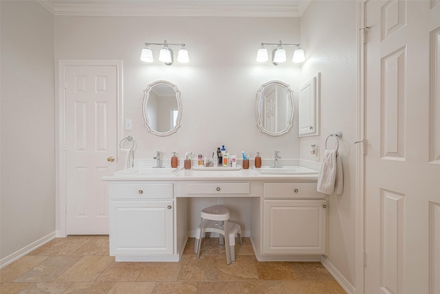 bathroom featuring vanity and ornamental molding