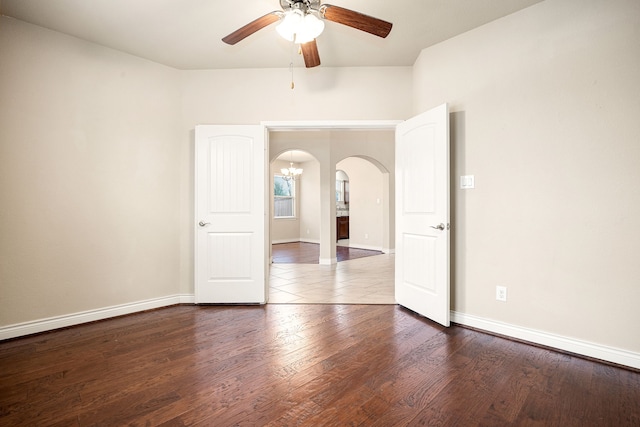 spare room featuring ceiling fan and wood-type flooring