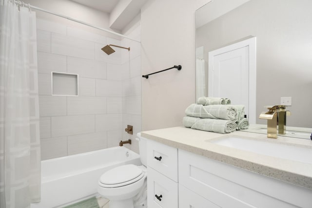 full bathroom featuring shower / bath combination with curtain, vanity, and toilet