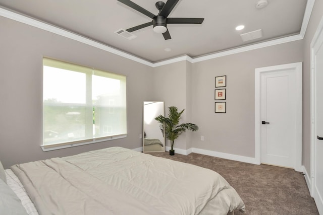 bedroom featuring crown molding, carpet floors, and ceiling fan