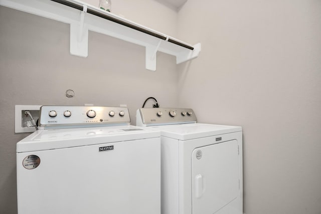 laundry area featuring washer and clothes dryer