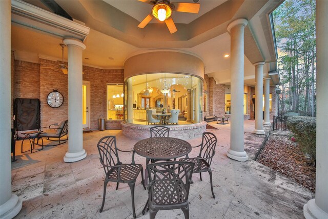 view of patio / terrace featuring ceiling fan