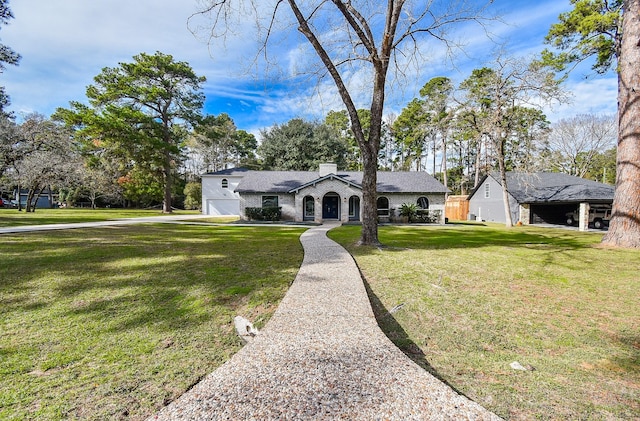 ranch-style house featuring a front lawn