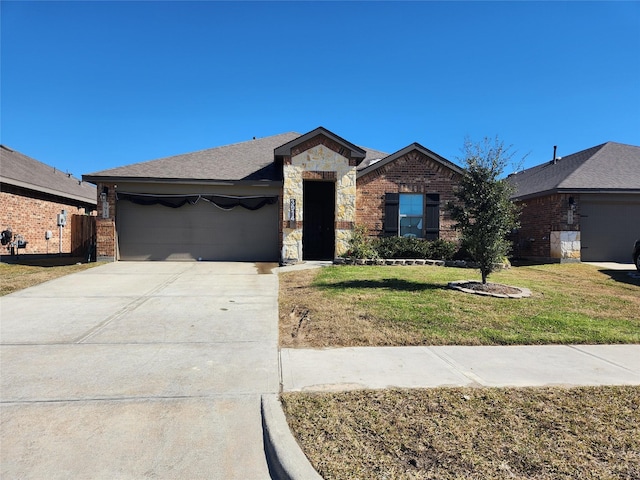 ranch-style house with a garage and a front lawn