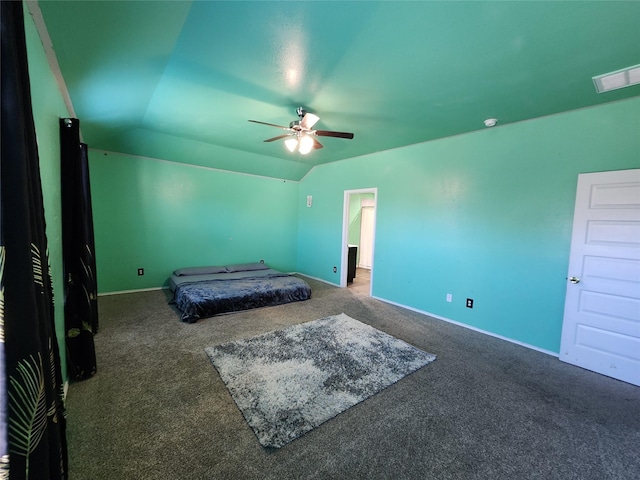 carpeted bedroom with vaulted ceiling and ceiling fan