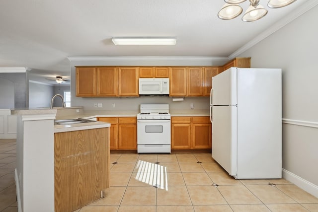 kitchen with sink, crown molding, white appliances, light tile patterned flooring, and kitchen peninsula