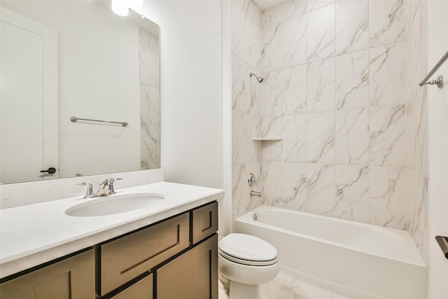 full bathroom featuring vanity, toilet, and tiled shower / bath combo