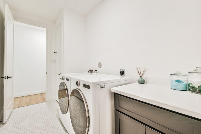 laundry area featuring washing machine and dryer