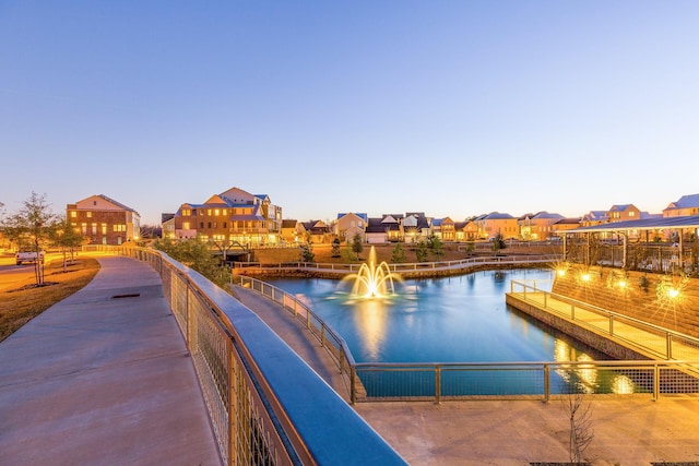 view of home's community with a water view