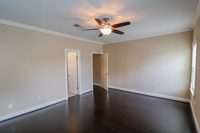 unfurnished room with crown molding, dark wood-type flooring, and ceiling fan