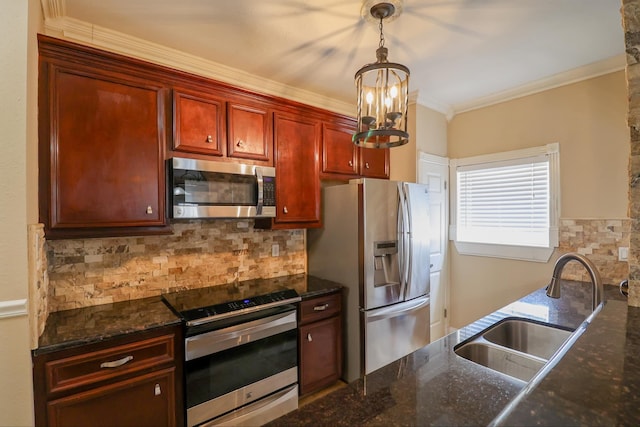 kitchen featuring sink, tasteful backsplash, ornamental molding, appliances with stainless steel finishes, and dark stone counters