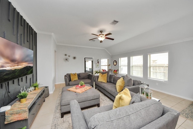 tiled living room with ornamental molding, lofted ceiling, and ceiling fan