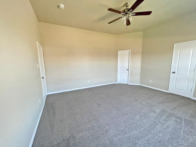 spare room with carpet floors and ceiling fan